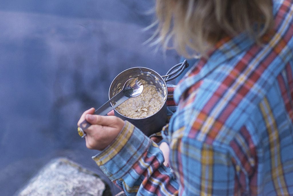 Camp kitchen essential: the Splitter titanium utensil used a spork are perfect for eating food even from deep cups and bowls