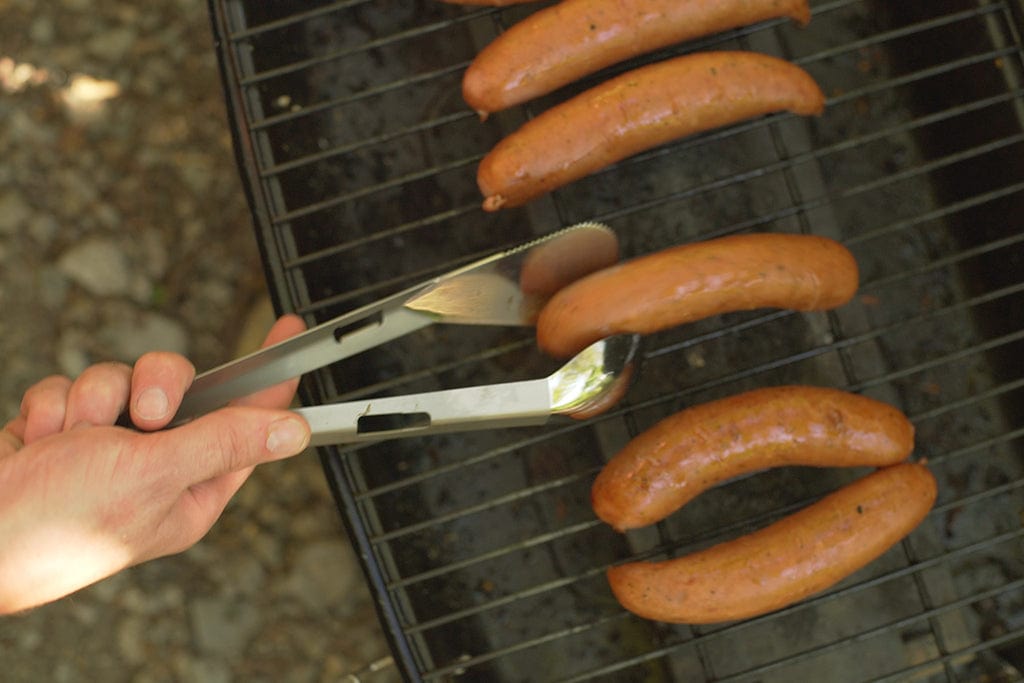 Camp kitchen essential: the Splitter titanium utensil used a set of tongs allow for easy grilling