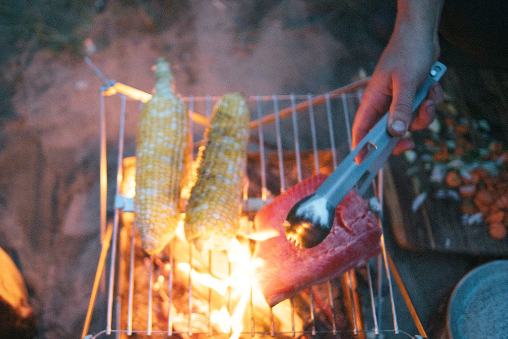 Camp cookware essential: the Splitter titanium utensil used a set of tongs can easily flip foods on the grill 