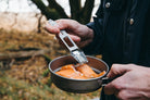 spork being used on the muncher titanium multi camping utensil